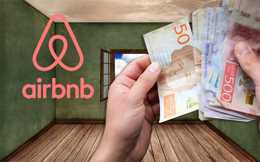 Airbnb:s logga och hand med pengar i lägenhet.
