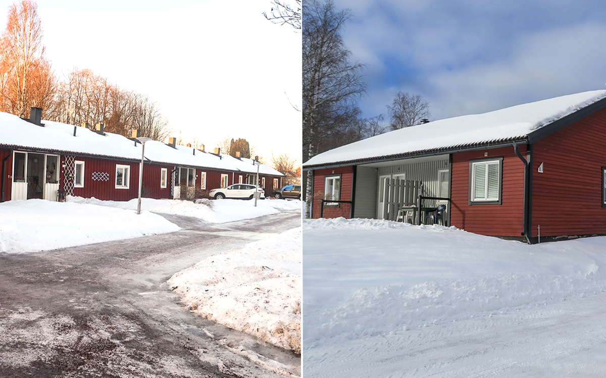 Röda hus. Snö på marken och på taken.