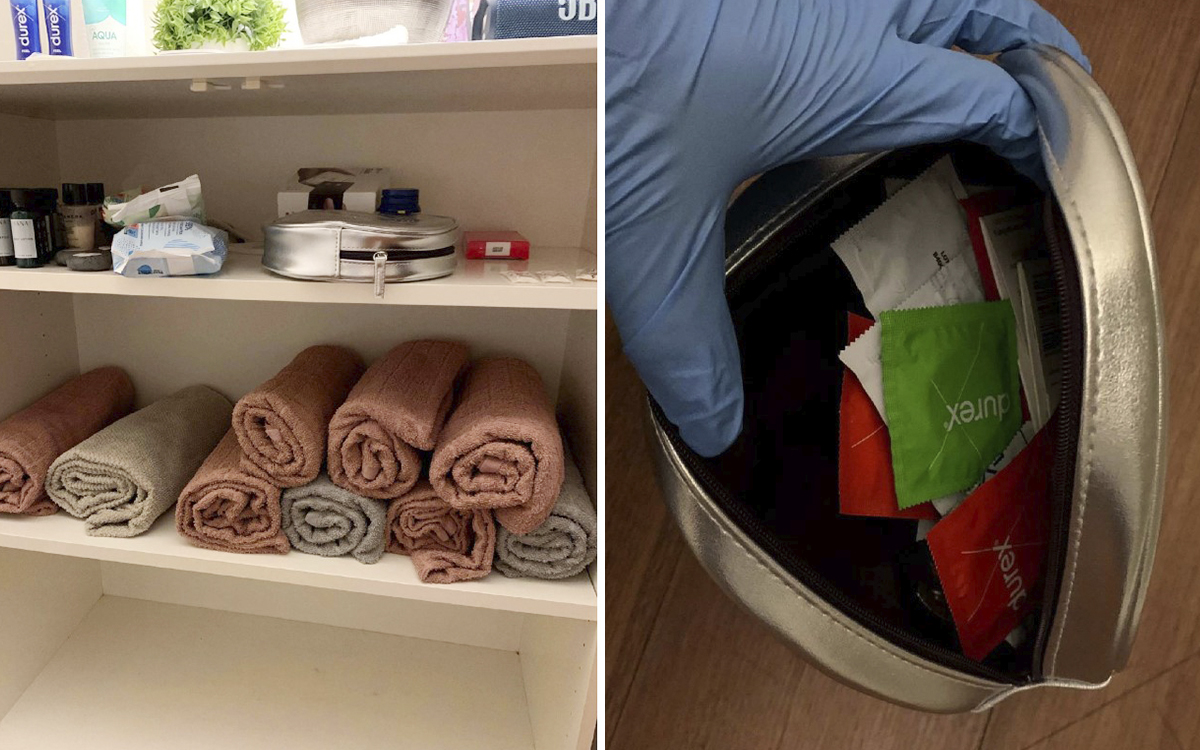 handdukar och kondomer i bokhylla