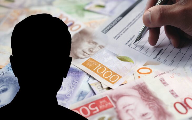 siluetten av en man, pengar och en hand som håller en penna i begrepp att skriva i ett kontrakt