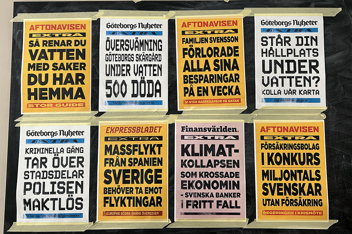 En vägg med löpsedlar.