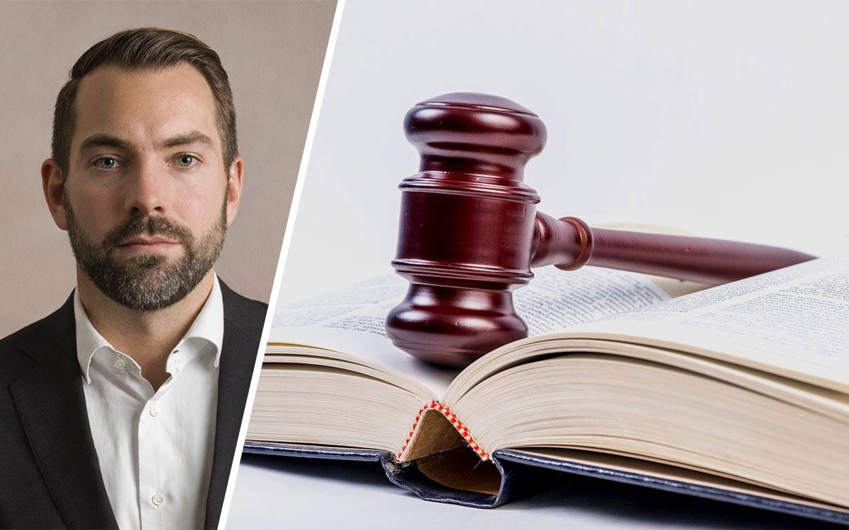 Advokat Johan Ramklint och en lagbok.