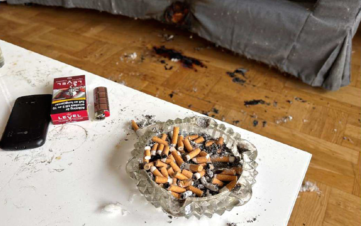 Kvinnan lovar efter domen att vara med aktsam och tömma askkoppen med cigaretter mer ofta.